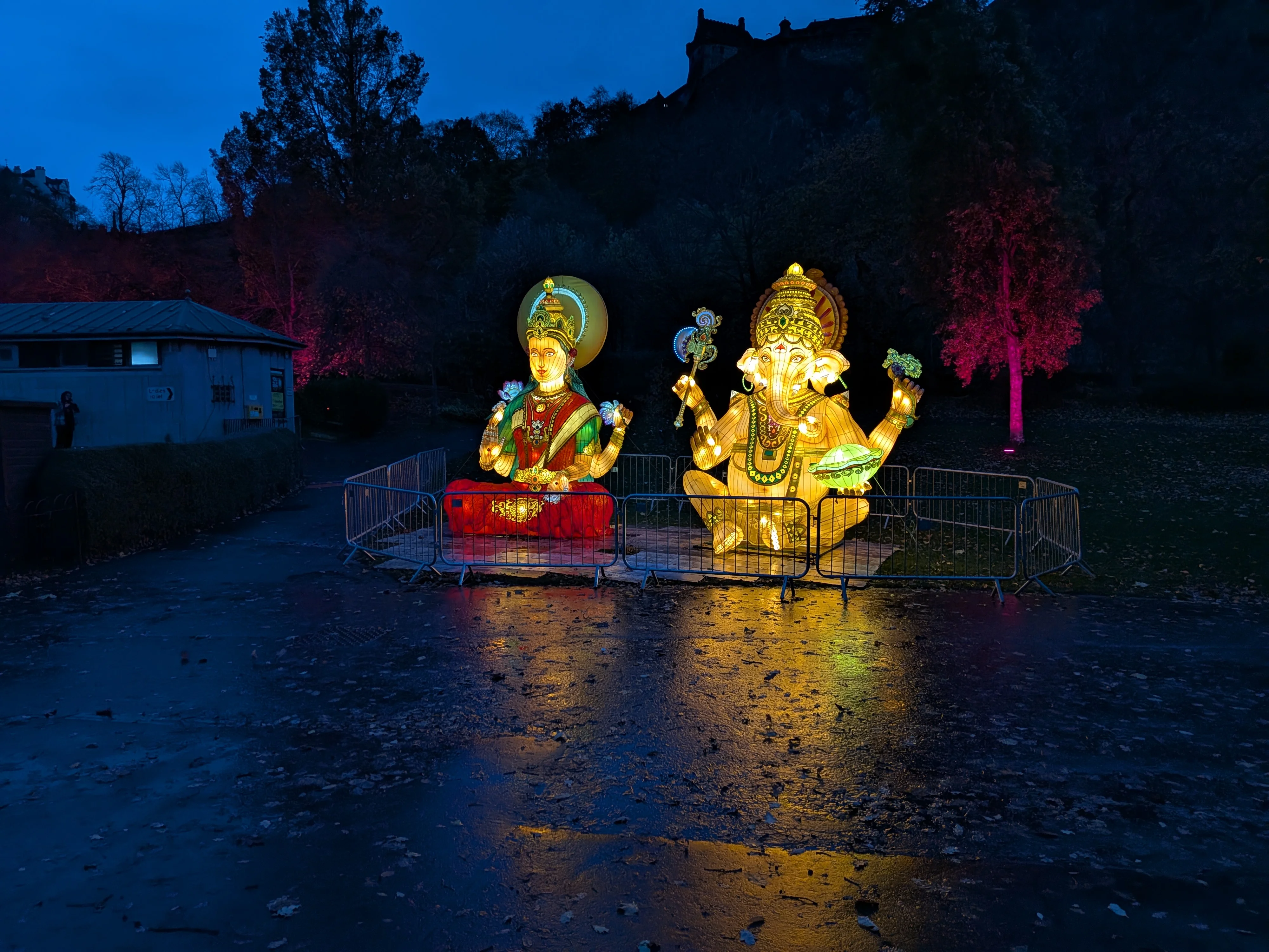 Illuminated statues of Goddess Lakshmi and God Ganesha